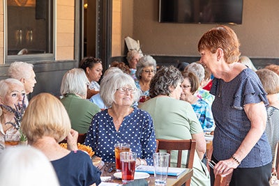 Guild members enjoying annual luncheon.