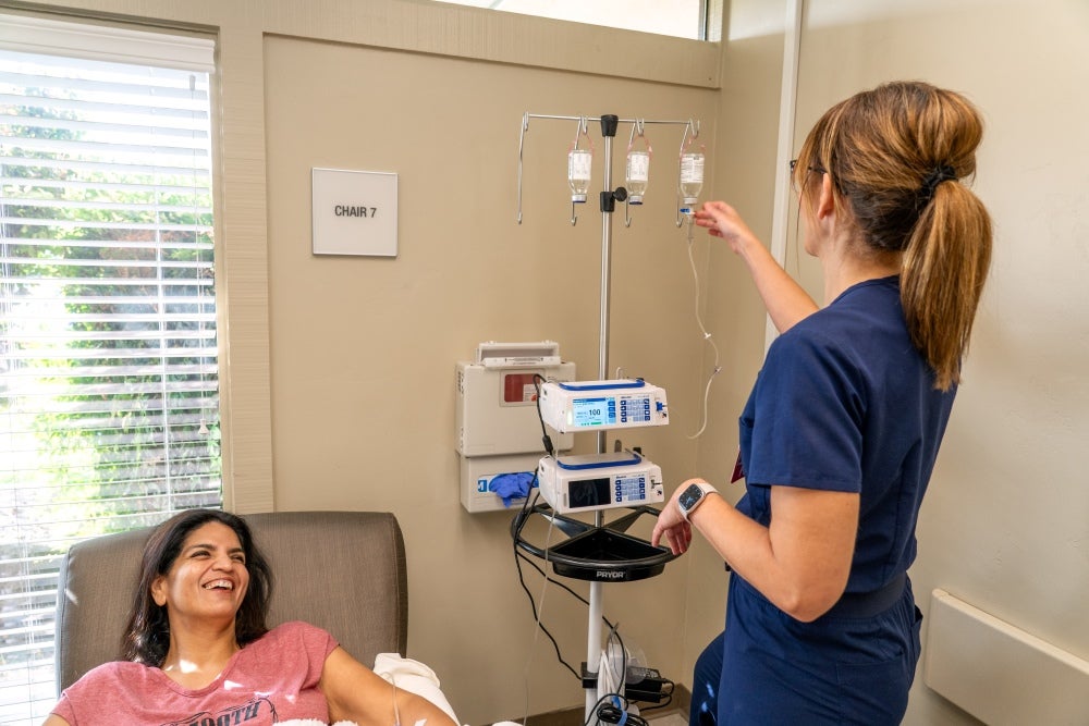 nurse checking the medication of patient