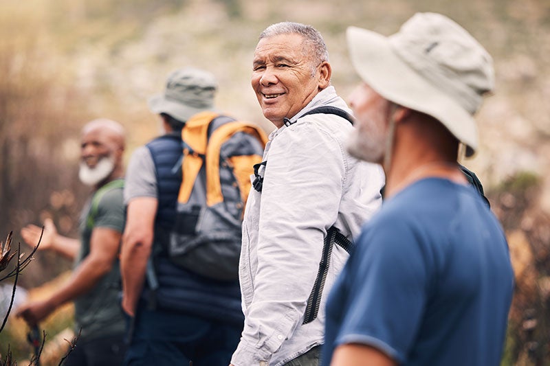 Man hiking with a group of friends
