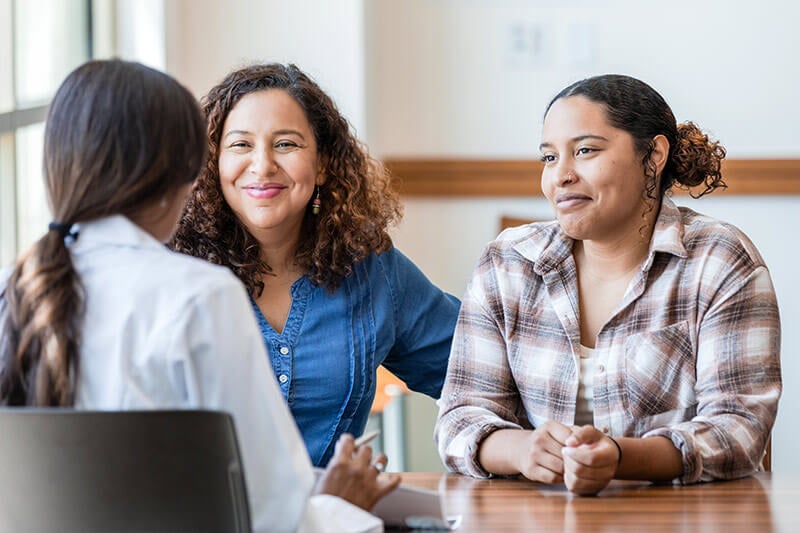 Two women at a doctors appointment