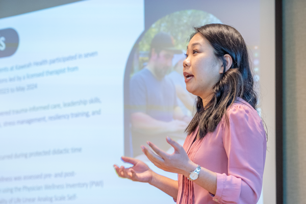 a doctor presenting research