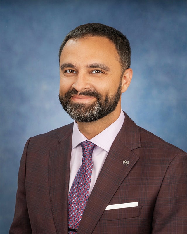 Dr. Gill
