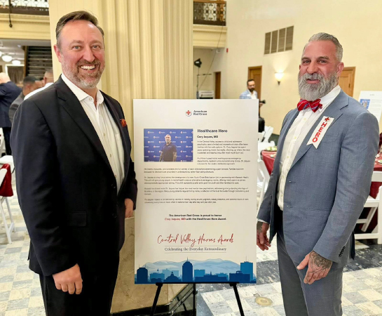 Kaweah Health CEO Marc Mertz and Dr. Cory D. Jaques celebrate the American Red Cross Healthcare Hero Award.