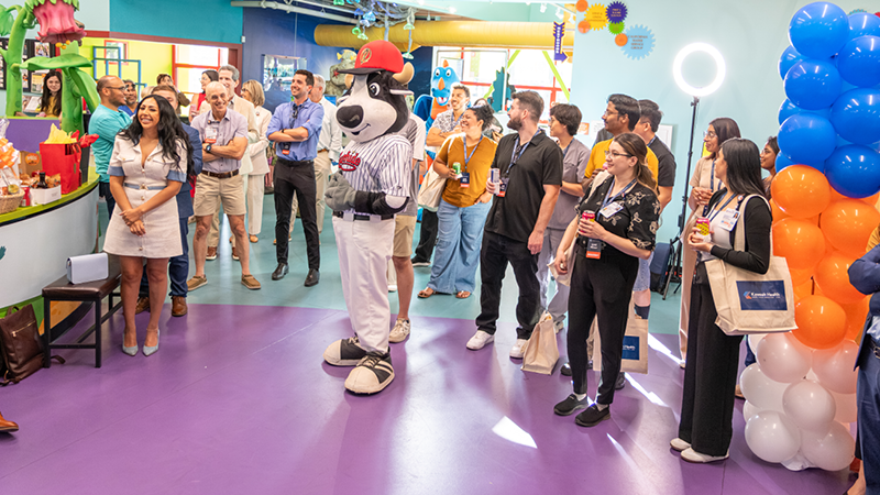 Visalia Rawhide's Tipper was one of the community members to welcome Kaweah Health's new residents at an event at ImagineU Children's Museum.
