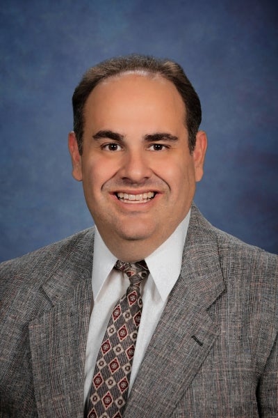 Kirk Coverston, M.D.